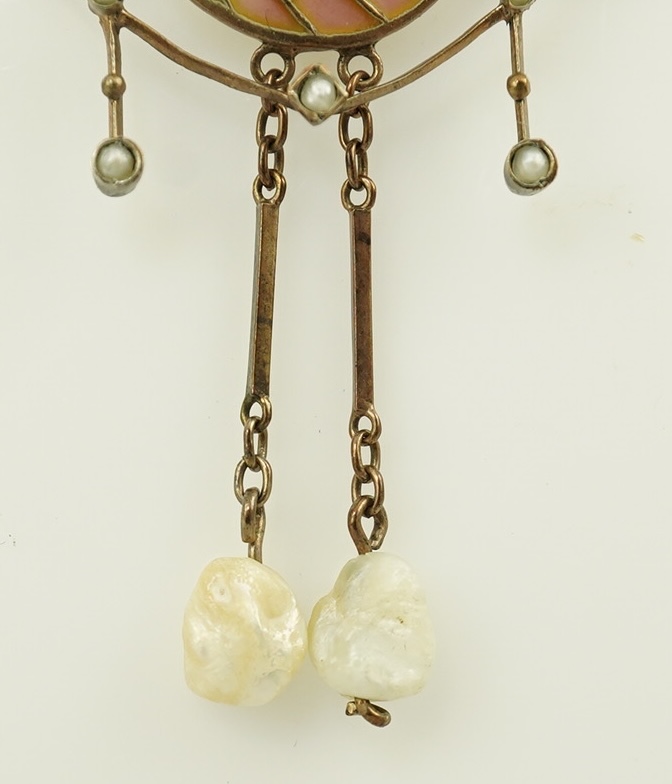 An early 20th century French silver gilt, baroque and seed pearl set plique a jour enamel pendant necklace